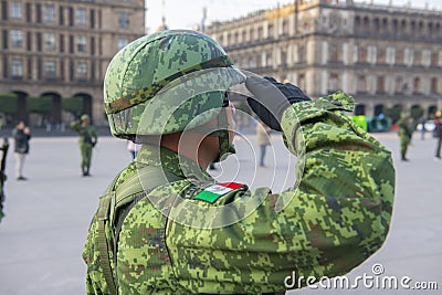 Soldier salute on Zocalo in Mexico City, Mexico Editorial Stock Photo
