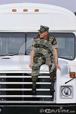 Soldier sitting on military bus Editorial Stock Photo