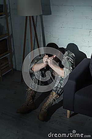 Soldier in uniform suffering from dissociation Stock Photo