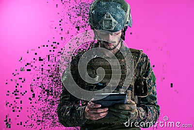 Soldier using tablet computer closeup pixelated Stock Photo
