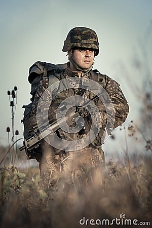 Soldier at war in the swamp Stock Photo