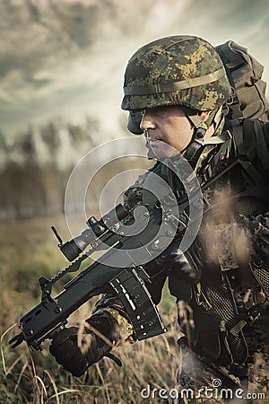 Soldier at war in the swamp Stock Photo