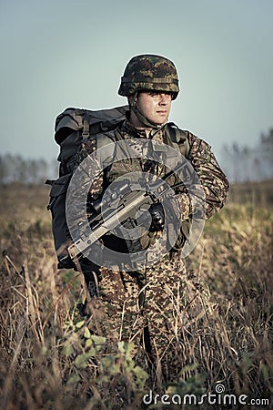 Soldier at war in the swamp Stock Photo