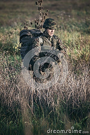 Soldier at war in the swamp Stock Photo