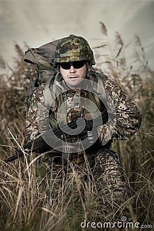 Soldier at war in the swamp Stock Photo