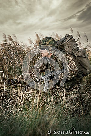 Soldier at war in the swamp Stock Photo