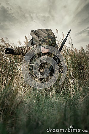 Soldier at war in the swamp Stock Photo