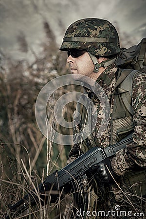 Soldier at war in the swamp Stock Photo