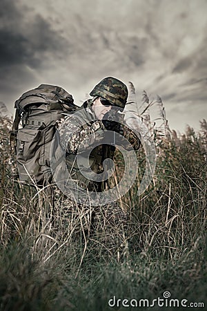 Soldier at war in the swamp Stock Photo