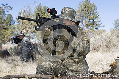 Soldiers Aiming Machine Guns Stock Photo