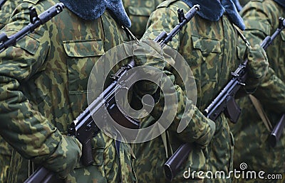 Soldiers in camouflage military uniform on rest position Stock Photo