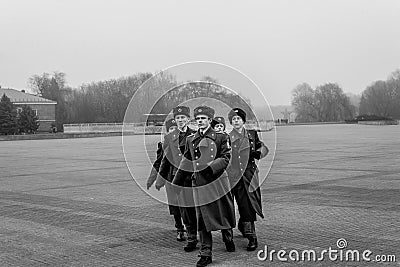 Soldiers marching and paying tribute to war memorial Editorial Stock Photo