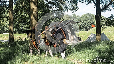 Soldiers at an reenactment walking away from the battle of Bourtange 1650 Editorial Stock Photo