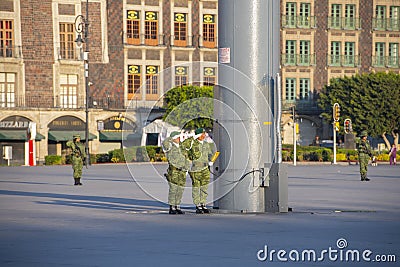 Soldier salute on Zocalo in Mexico City, Mexico Editorial Stock Photo