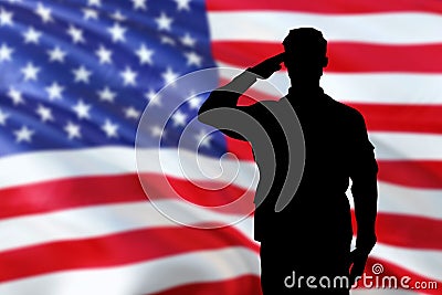 Soldiers silhouette saluting the USA flag for memorial day or veterans day Stock Photo
