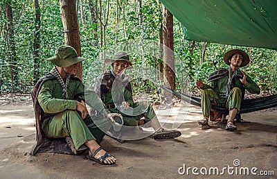 Soldiers sitting under a canopy. Editorial Stock Photo