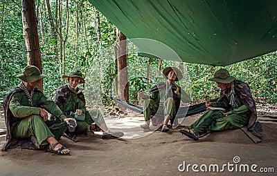 Soldiers sitting under a canopy. Editorial Stock Photo