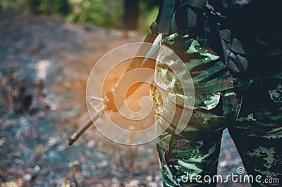 Soldiers stand in frontier zone. Armed with a pair of guns To pr Stock Photo