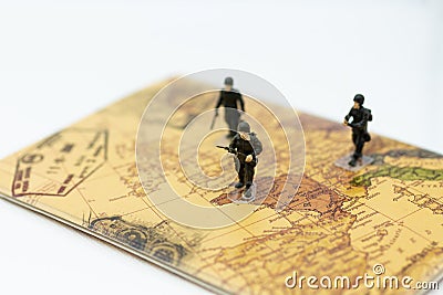 Soldiers walking on the country map, duty keeping the people and the country Stock Photo