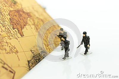 Soldiers walking on the country map, duty keeping the people and the country Stock Photo