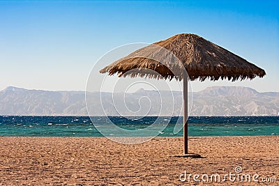 Sole sunshade on a beach Stock Photo