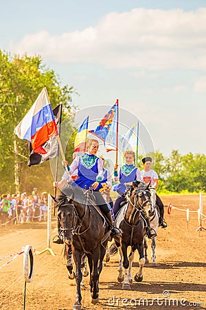 Solemn entry of the group of horse racing at the festival Editorial Stock Photo