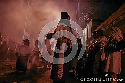 Holy Week in Guatemala: The All Female Penitential Procession of the Seven Sorrows of the Blessed Virgin Mary at night Editorial Stock Photo