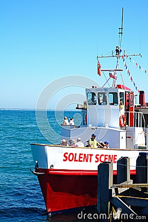 Solent Scene ship along Swanage pier. Editorial Stock Photo