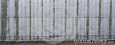 Solid wall from sheets of galvanized roofing iron Stock Photo