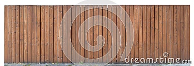 Solid wooden fence from brown vertical boards Stock Photo
