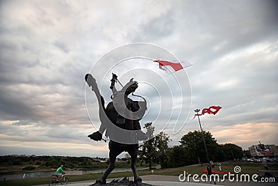 In solidarity with the people of Belarus, next to the Kaunas Castle and the Vytis Monument with the help of the kite the national Editorial Stock Photo