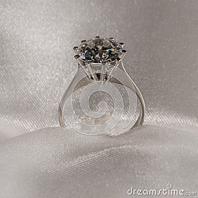 Solitair brilliant diamond on gold ring Stock Photo