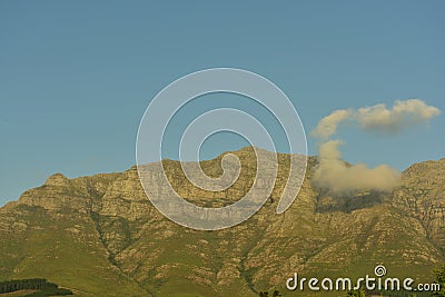 A solitary cloud in the shape of the letter C Stock Photo