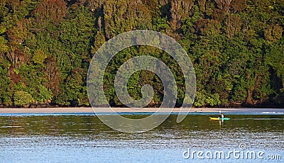 Kayaker in Stewart island, New Zealand Editorial Stock Photo