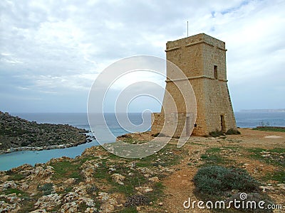 Solitary Watch Tower Guarding the Coastline Stock Photo