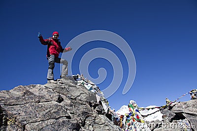 Solitude lady trekking in Himalayas region Stock Photo