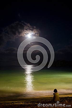 Solitude at night ocean with moon Stock Photo