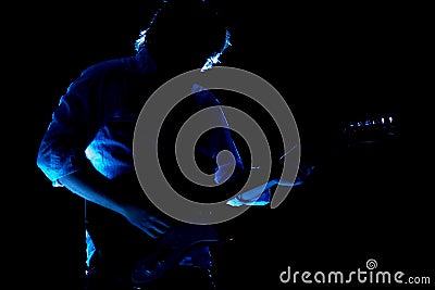 Solo guitarist at a show Stock Photo