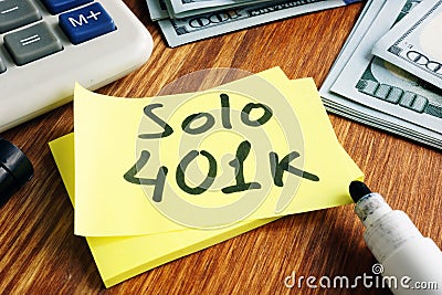 Solo 401k concept. Piece of paper and calculator Stock Photo