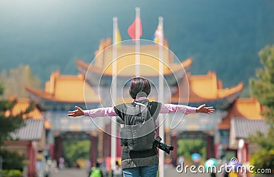 Solo travel female tourist at Chongsheng Temple in Dali old town,Yunnan ,China Stock Photo