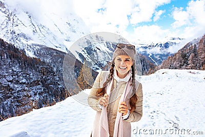 Solo traveller woman in front of mountain landscape Stock Photo
