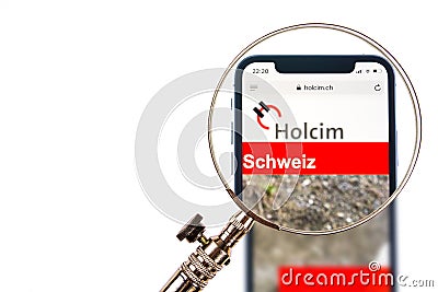 SOLOTHURN, SWITZERLAND - NOVEMBER 11, 2018: Holcim logo displayed on a modern smartphone Editorial Stock Photo