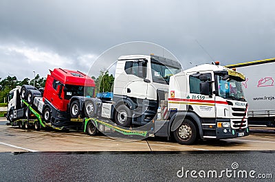 Soltau, Germany - August 28, 2021: Specially designed truck for the transport of trucks. HÃ¶dlmayr International AG is a family- Editorial Stock Photo