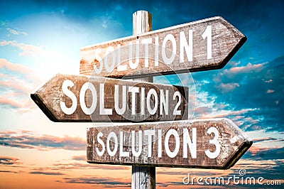 Solution 1, 2, 3 - wooden signpost, roadsign with three arrows Stock Photo