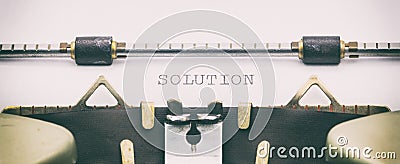 SOLUTION word in capital letters on a typewriter sheet Stock Photo