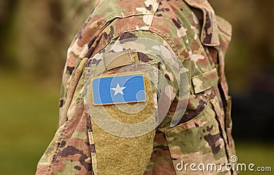 Somalia flag on soldiers arm collage Stock Photo