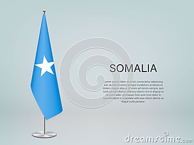 Somalia hanging flag on stand. Template forconference banner Stock Photo