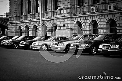 Some beautiful Mercedes stand in a row on the parking. Stock Photo