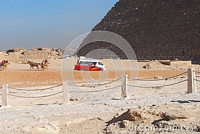 Cars infront of pyramide in Egypte Editorial Stock Photo