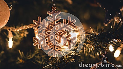 Snow Flake backlighted on a christmas tree Stock Photo
